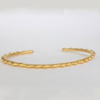 the 18K yellow gold bracelet, entitled the wellness bracelet. Thissophisticated gold bracelet is designed for curvaceous women and can be worn as a stackable bracelet. Thisfine jewelry collection is designedby a locally New York City jewelry artist