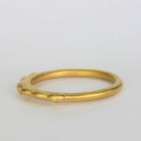 an18k yellow gold ring.This gold single band ring is made locally in NYC and can be worn as a single or double stackable ring. This Fine Jewelry Collection is sold on Ezzykaia’s jewelry online store